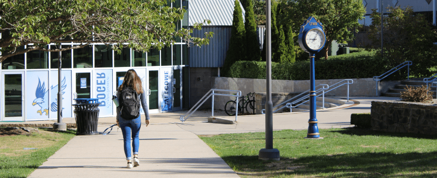 Girl walking on campus